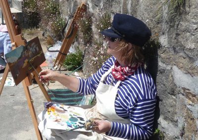 Painting with Sophie Walbeoffe by the Mousehole harbour