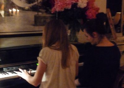 Playing a duet on the piano
